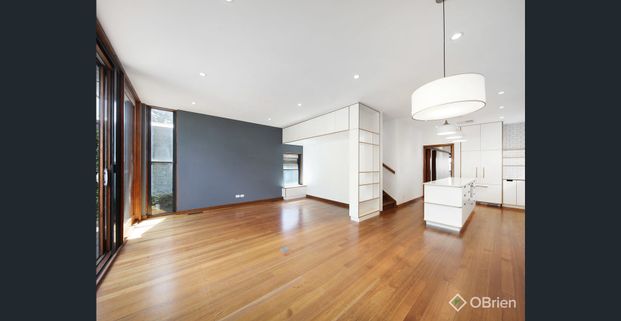 Sun-Filled 1940s Architecturally Renovated Charmer in Prime McKinnon Zone - Photo 1