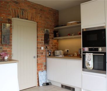 Available early December, 1 The Cottages is a welcoming two bedroom... - Photo 1