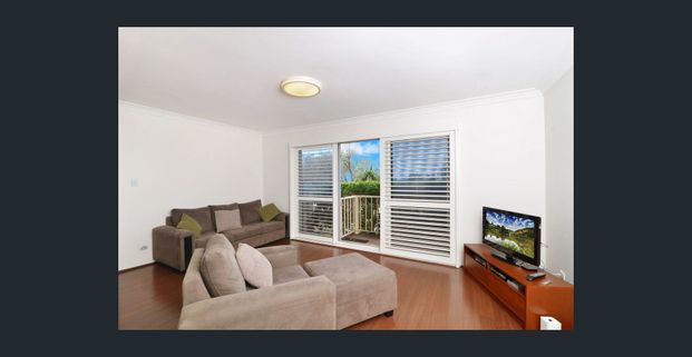 Stunning Beachside Apartment - Photo 1