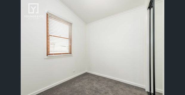 CENTRAL AND CHARMING - Photo 1