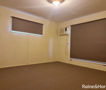 THREE BEDROOM HOME WITH AC THROUGHOUT AND DOUBLE BAY SHED - Photo 1