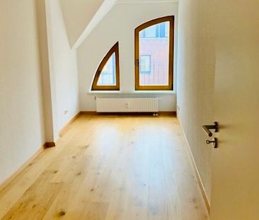 Gemütliche 4-Zimmer-Dachgeschosswohnung in der Rostocker KTV - Foto 3