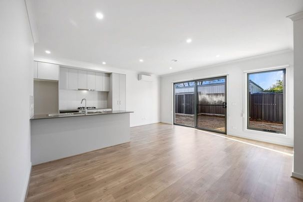 Modern 4 Bedroom Townhouse - Low-Maintenance Living - Photo 1