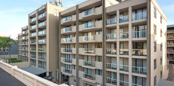 Fully Furnished One-Bedroom Apartment with CBD Views - Photo 2