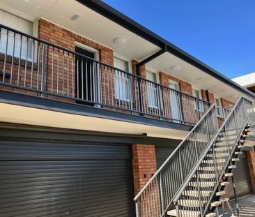 Air-conditioned one bedroom unit with extra large garage - Photo 1