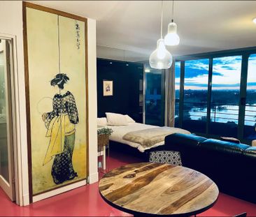 10 Month lease-Fully Furnished Oversized Studio with 180-degree unb... - Photo 6