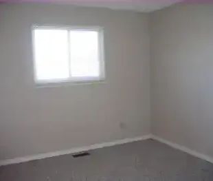 Bright Bedroom | Calgary - Photo 1