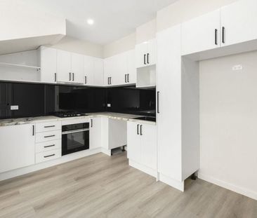 Modern Townhouse Living in the Heart of Meadow Heights - Photo 1