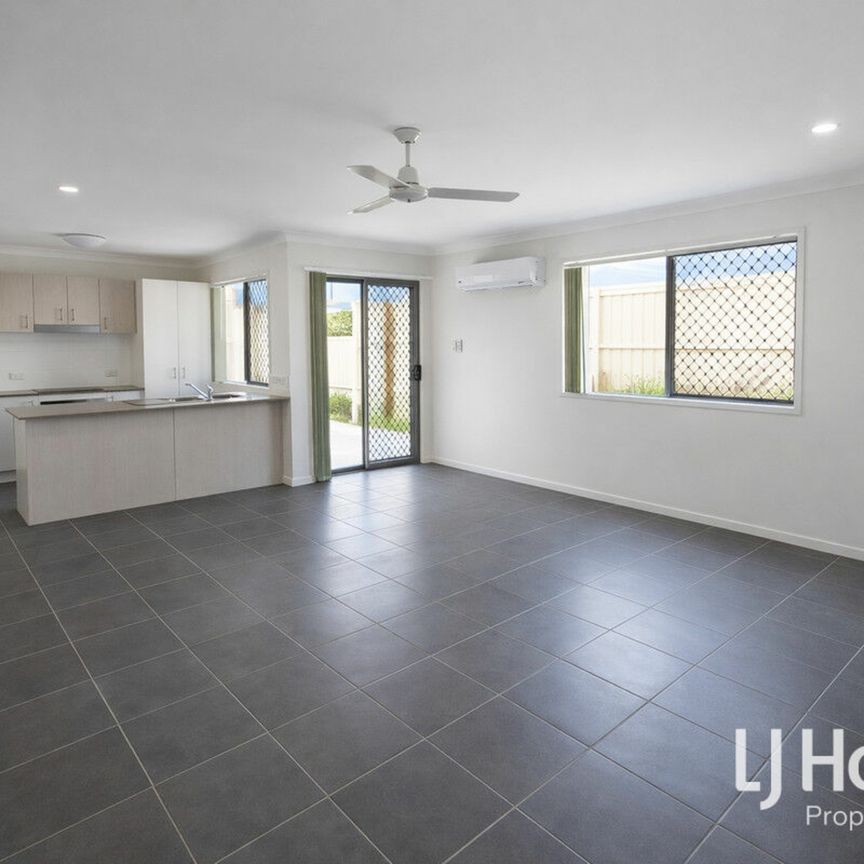 Affordable Comfort in Prime Loganlea Location! - Photo 1