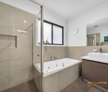 For Lease - Live Brightly in This 4-Bedroom Modern Retreat - Photo 1