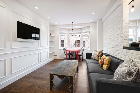 A modern and bright one-bedroom apartment benefitting from wooden floors throughout, concierge and lift access in Cranmer Court SW3. - Photo 2