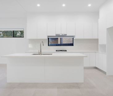 Near new, spacious four bedroom duplex backing onto a reserve - Photo 5