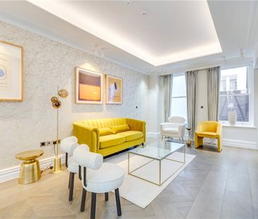 A comprehensively refurbished three storey mews house of just over ... - Photo 4