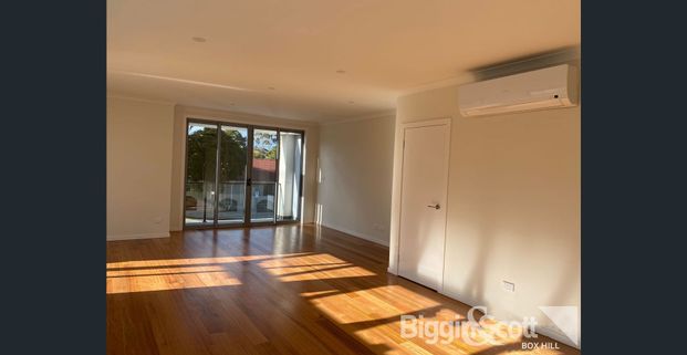 Spacious Three-Bedroom Townhouse for Lifestyle Living - Photo 1