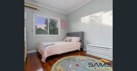 Immaculate Air-Conditioned Home with Spacious Living, Private Deck & Pet-Friendly Yard - Photo 3