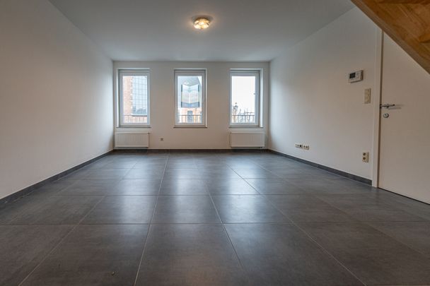Duplexappartement met groot terras in het centrum van Schriek. - Foto 1
