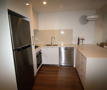 PARTIALLY FURNISHED ONE BEDROOM APARTMENT! - Photo 6