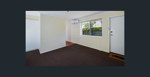 NEAT AND TIDY UNIT WITH COURTYARD - Photo 1