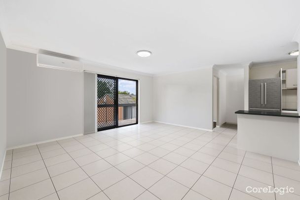 Spacious 3-Bedroom Unit in Great Location - Photo 1