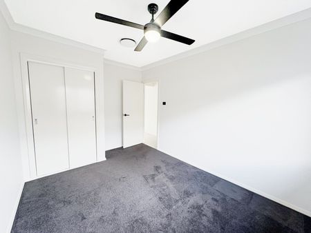 Stylish Family Home in the Heart of Aberglasslyn - Photo 4