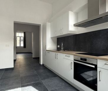 Appartement te huur in Andenne voor € 980 met 1 slaapkamer - Photo 5