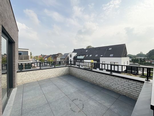 Nieuwbouwappartement met twee slaapkamers, terras en garage - Photo 1