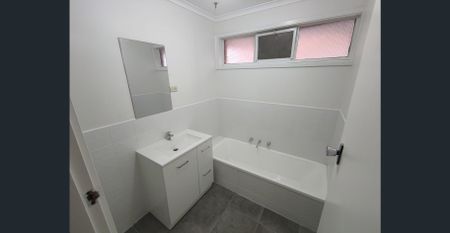 Central Location, Low Maintenance - Photo 4