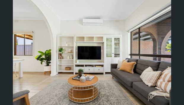 4 BEDROOM HOME OFFERING COMFORT & CONVENIENCE IN PRIZED ZONES - Photo 1
