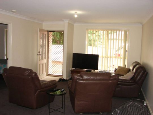 BEAUTIFULLY APPOINTED AND FULLY FURNISHED TWO (2x) BEDROOM FREE STANDING MODERN BRICK DWELLING WITH GARAGE - Photo 1