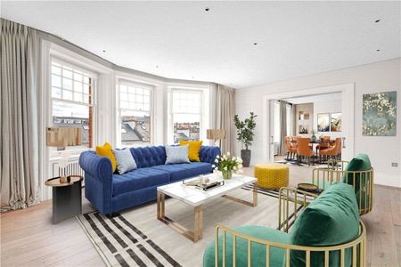 A magnificent top floor (third floor with lift) four bedroom, three bathroom flat presented in immaculate order with a modern kitchen and bath/shower rooms. Thanks to the unobstructed views and period features the principal reception rooms east-facing and offer plenty of nat - Photo 3