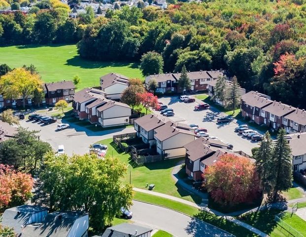 Surrey Place Townhomes | 2591-2601 Bridle Path Drive, Ottawa - Photo 1