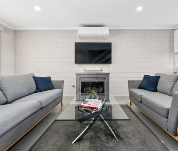 Convenient Two-Bedroom Townhouse - Photo 2