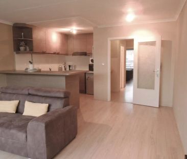 Ongemeubeld lichtrijk appartement met twee slaapkamers - Photo 3