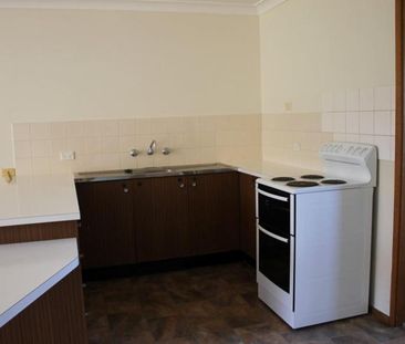 Tidy Two-Bedroom Unit in Peaceful Location - Photo 5