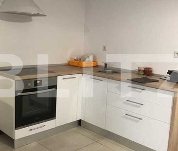 Apartament de inchiriar cu doua camere semidecomandate, 52 mp, parcare subterana, zona Calea Baciului - Photo 2