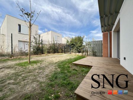 T2 AVEC TERRASSE + JARDIN + PARKING SOUS-SOL - Photo 5