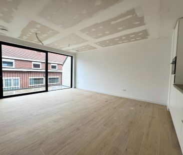 Nieuwbouwappartement (70m²) met 1 slaapkamer, staanplaats en kelder... - Foto 1