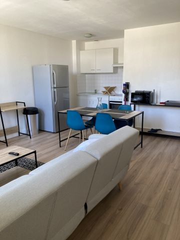 Location Appartement 3 pièces 55m² LIBOURNE 33500 - Photo 2