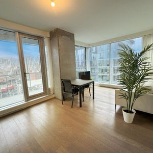 Unité de Coin Lumineuse au Cœur du Centre-Ville de Montréal - Photo 2