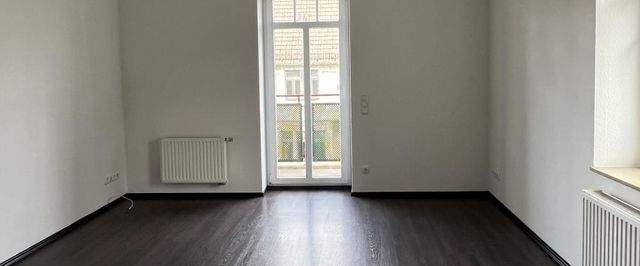 Individueller Dachtraum mit Balkon und traumhaften Blick zum grünen Park! Lift! - Foto 1