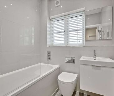 A refurbished four-bedroom family home in excellent proximity to lo... - Photo 5