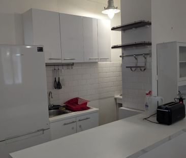 COMMERCE - 2p meublé 51 m² rue Quinault - Photo 5