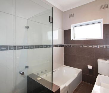 OVERSIZED ONE BEDROOM UNIT WITH LEAFY OUTLOOK - Photo 5