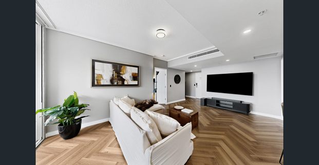 A Statement in Style | Exquisitely Renovated CBD Apartment with Spectacular Views - Photo 1