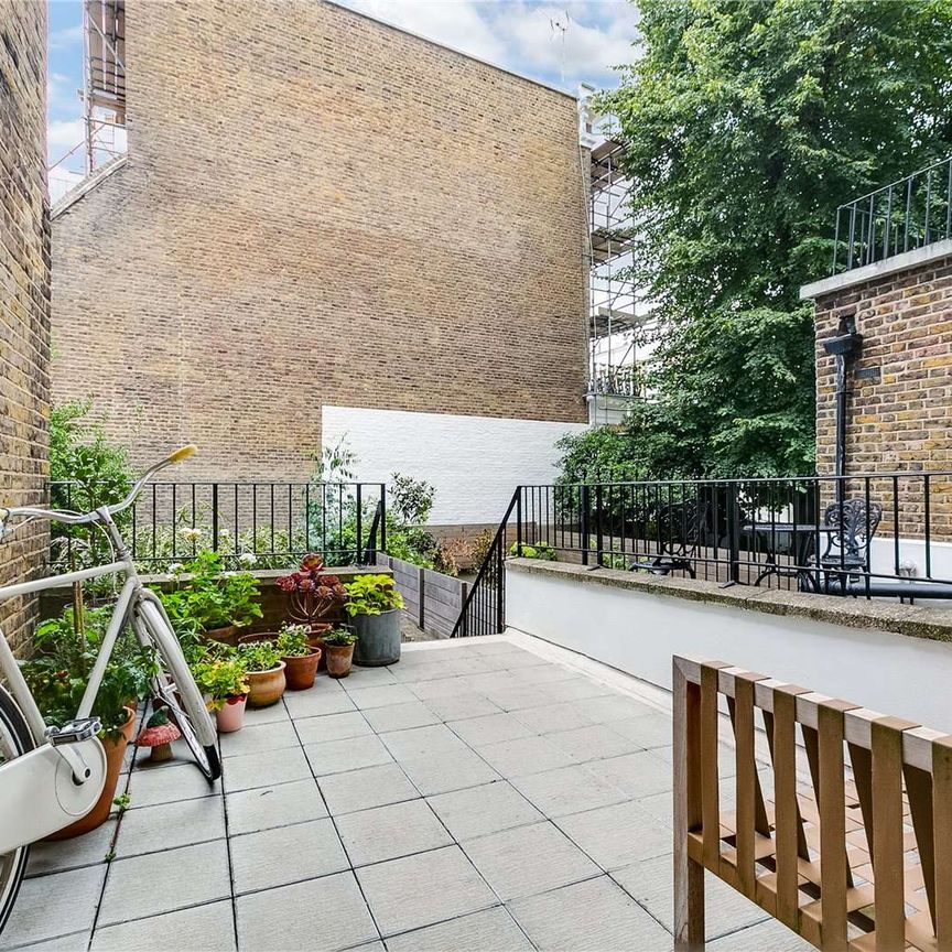 A spacious three bedroom apartment with private patio garden. - Photo 1