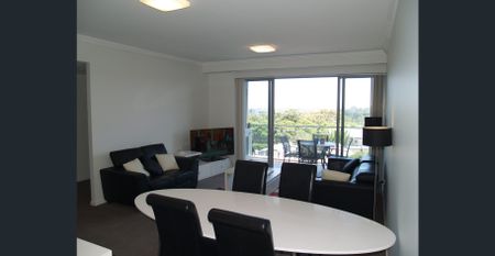 Experience sophisticated living in the heart of a vibrant lifestyle district - Photo 2