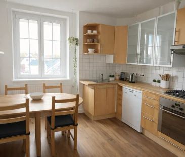 Wunderschöne Dachgeschosswohnung im Zentrum - Foto 3