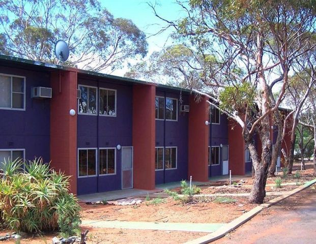 This 2 bedroom, 1 bathroom double story unit is up for lease. - Photo 1