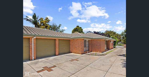 Neat & Convenient Coastal Living! - Photo 1