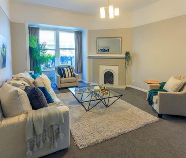 This sunny inviting family home - Photo 2